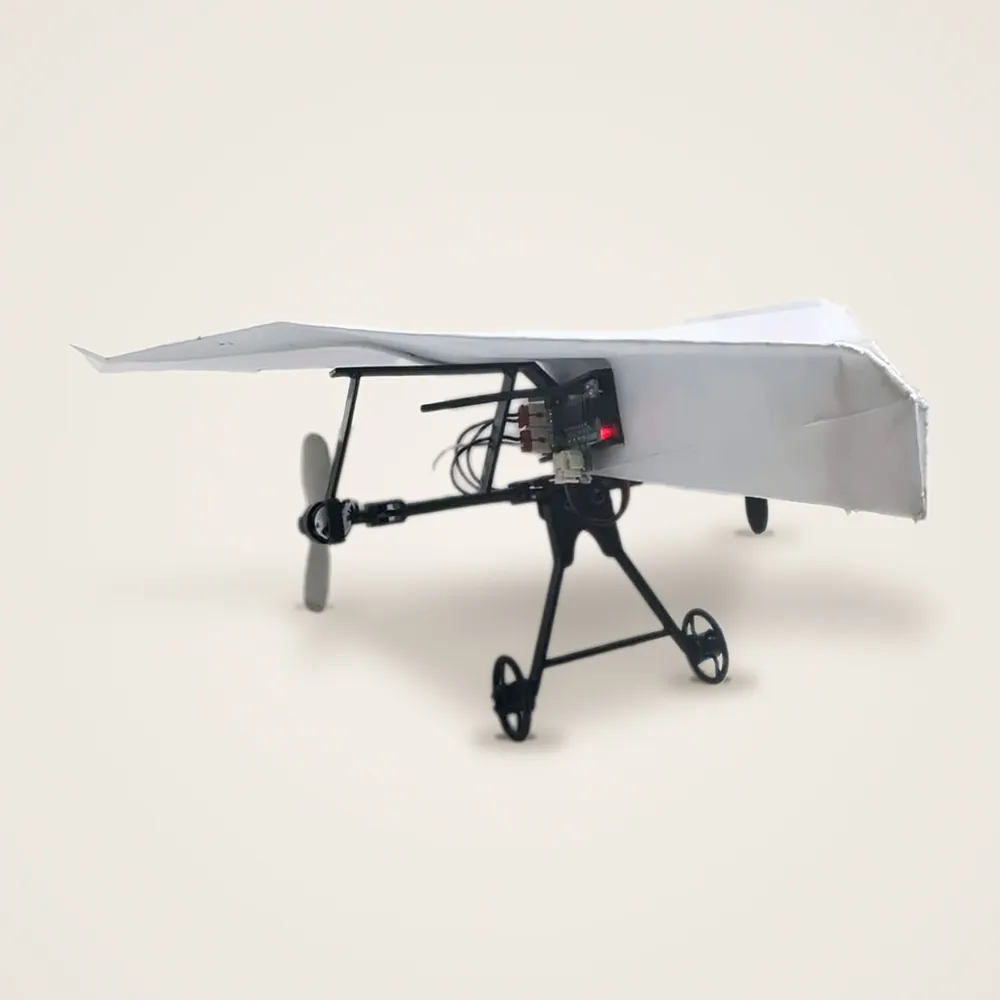 Avión RC de papel armado: ala de papel, chasis con 2 motores, hélice y tren de aterrizaje